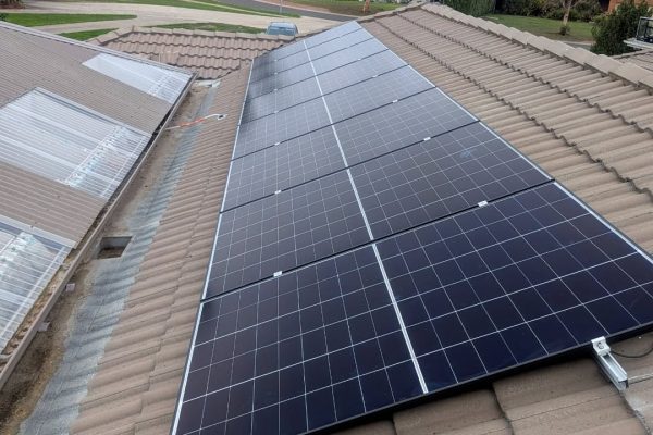 Solar panel installation on a tiled roof by Quantum Electrical Services
